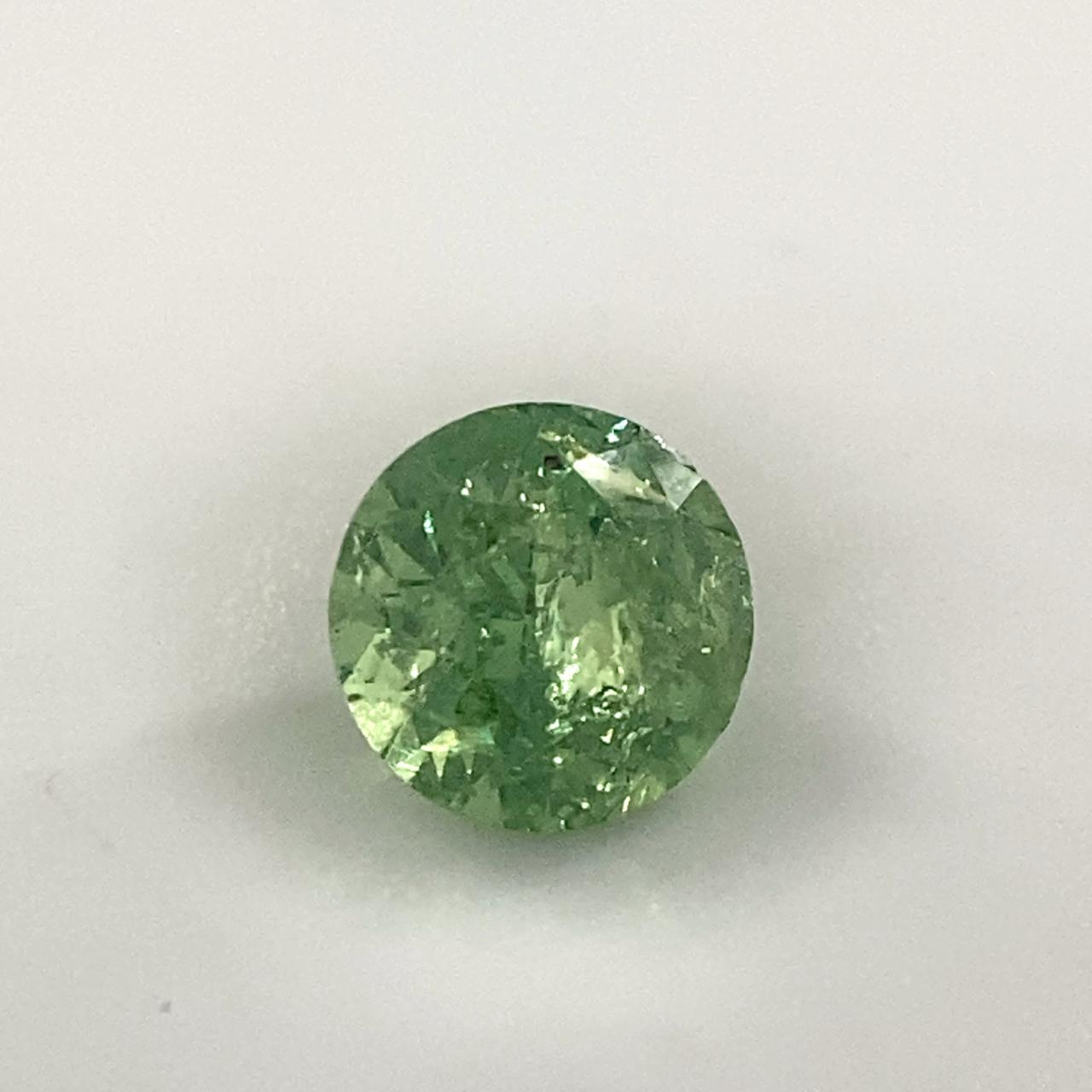 0.6ct Demantoid garnet